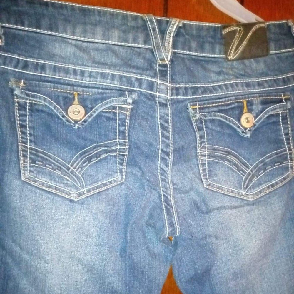 VANITY JEANS WITH BUTTON BACK POCKETS!